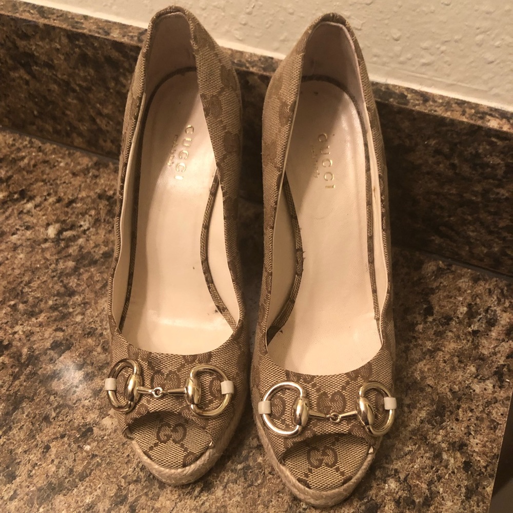 Gucci wedges. Scratch on one of the front buckles